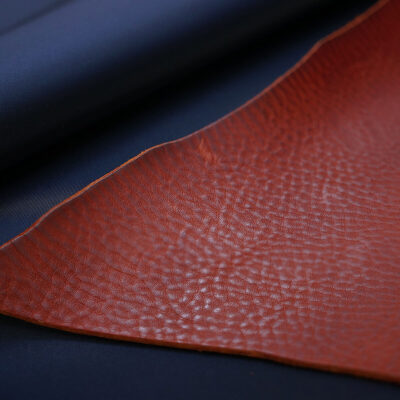 Crossbody bag with pinched side gussets