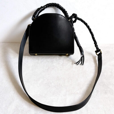 Leather bag with braided leather handles