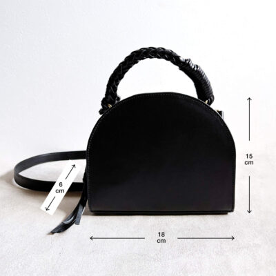 Leather bag with braided leather handles