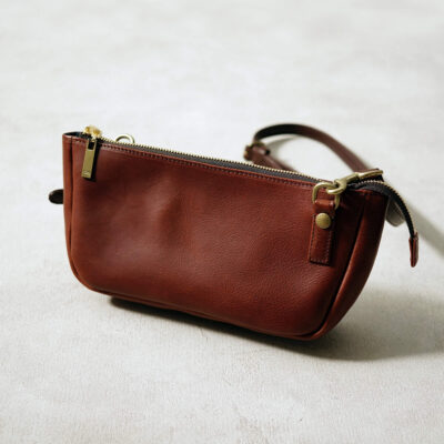 Oiled leather small crossbody bag